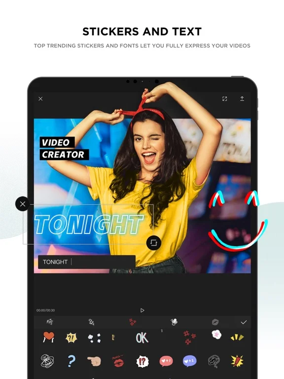 Chèn chữ và sticker lên video, chọn từ kho có sẵn rồi kéo vào vị trí.